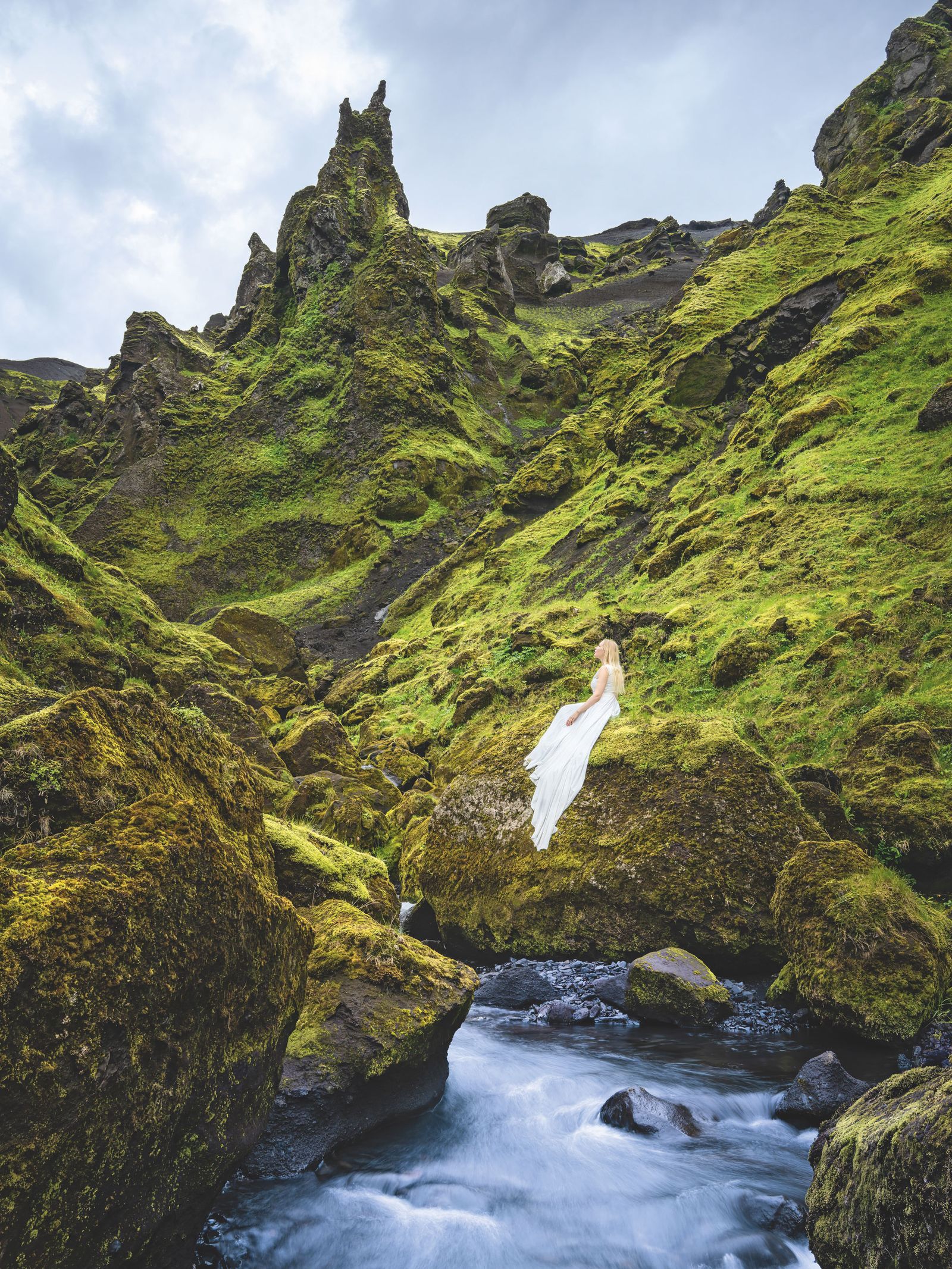 Image may contain Rock Nature Outdoors Wilderness Moss Plant Landscape Scenery Vegetation Stream Water and Green
