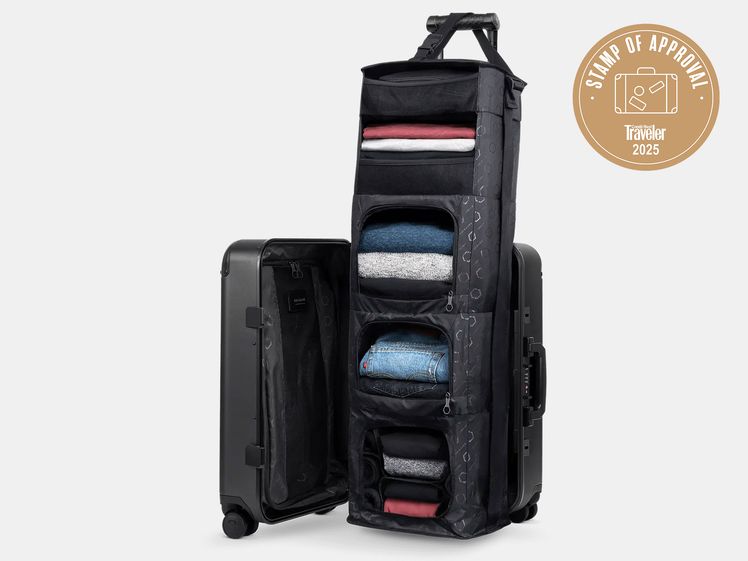 Black rolling carry-on closet