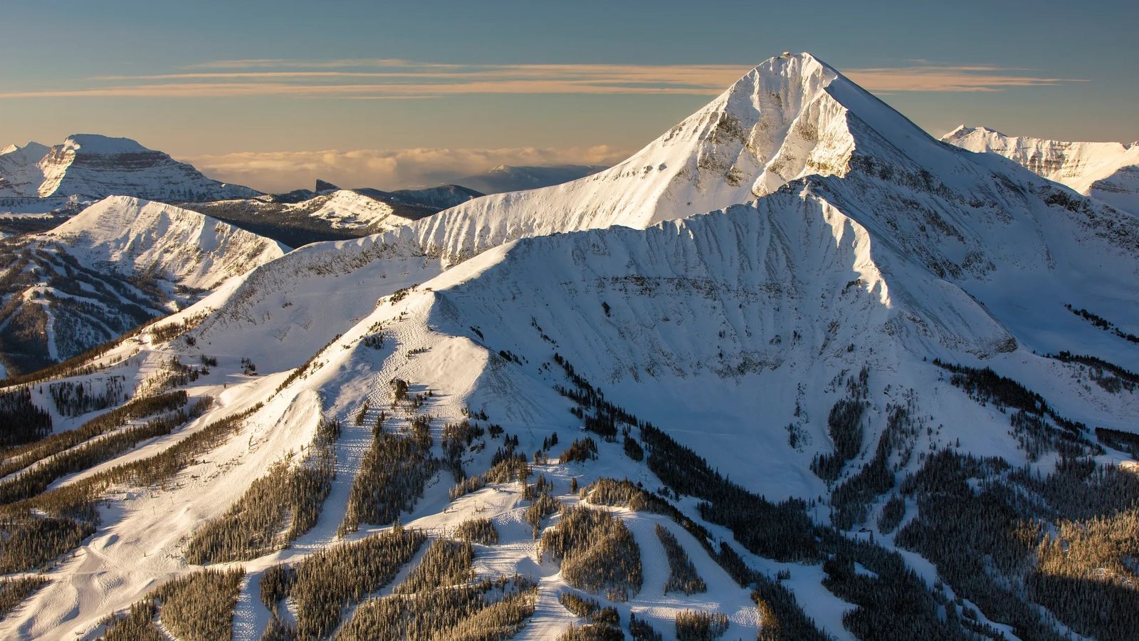 A sprawling view of Big Sky Resort's mountain range in Montana