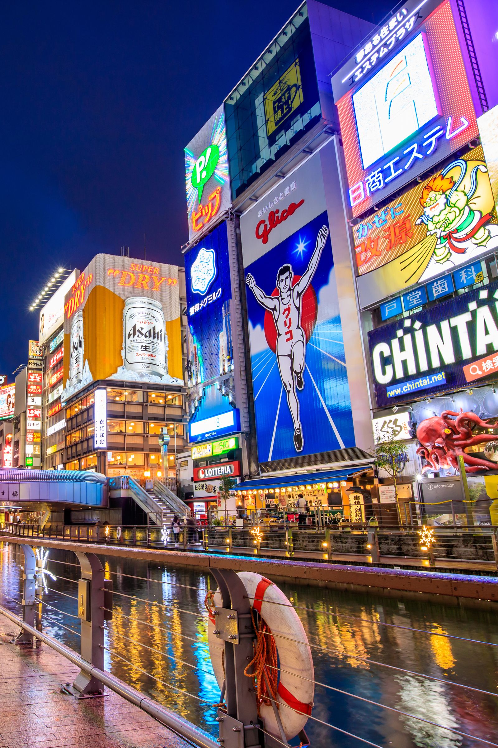 Image may contain Urban Architecture Building Cityscape City Water Waterfront Metropolis Person and Advertisement