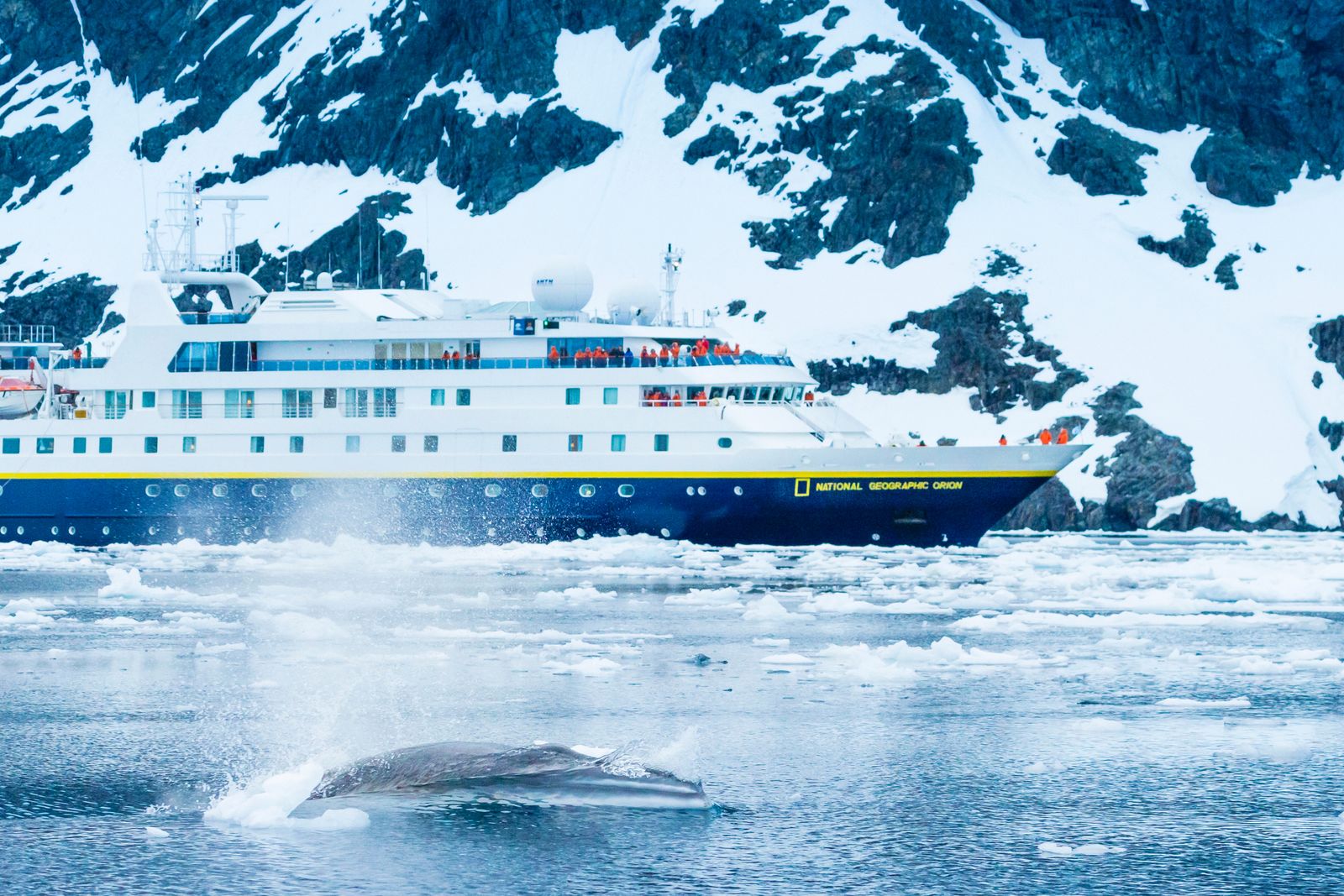 Image may contain Boat Transportation Vehicle Watercraft Ice Ship Glacier Mountain Nature and Outdoors