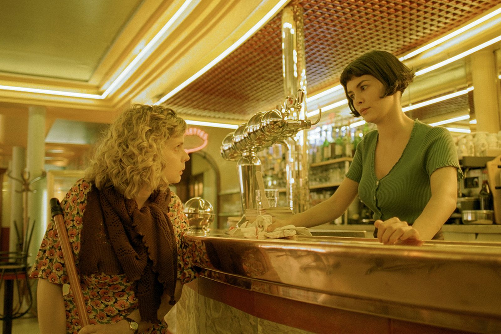 Image may contain Isabelle Nanty Audrey Tautou Pub Person Teen Alcohol Bar Bar Counter Beverage Adult and Glass