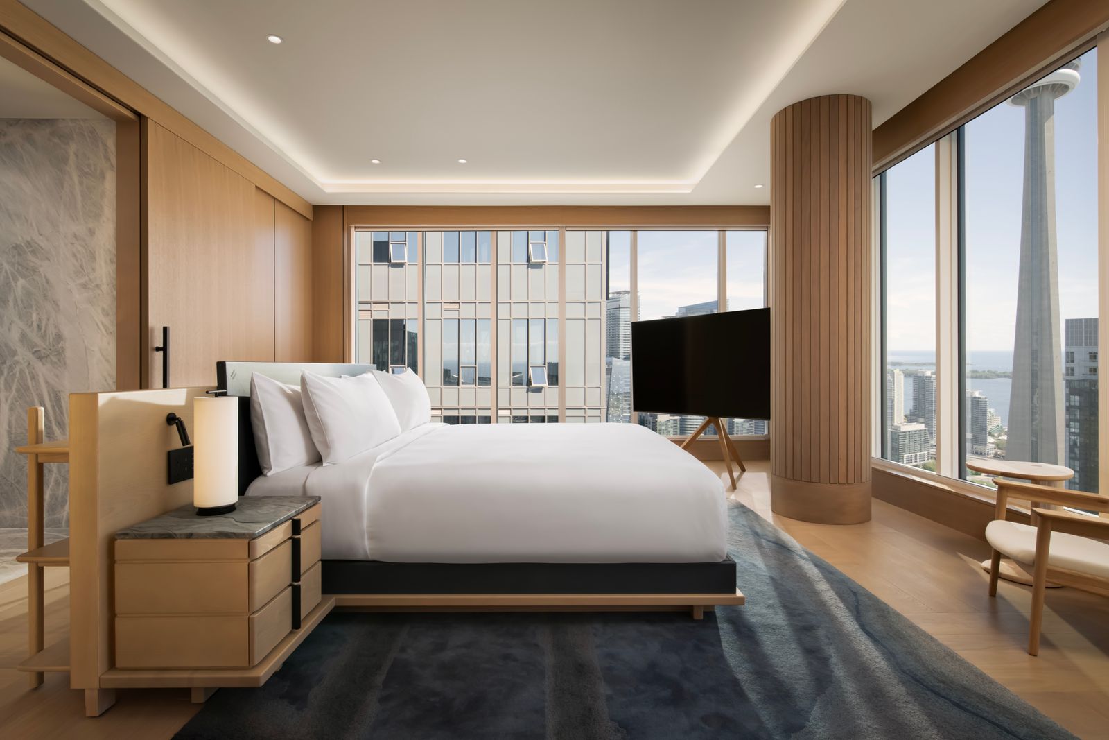 Image may contain Indoors Interior Design Home Decor Bed Furniture Bedroom and Room
